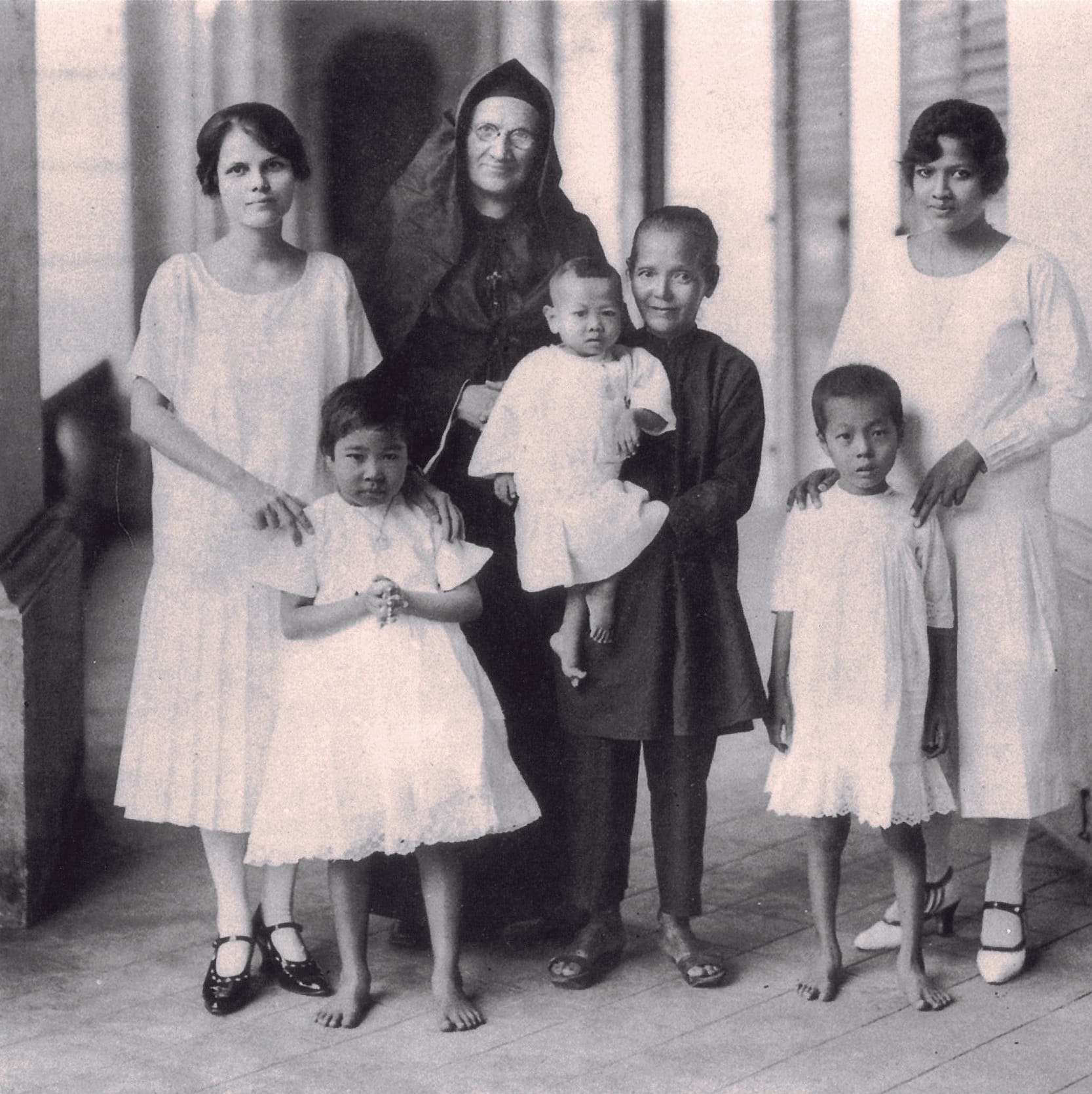 Sisters and orphans at the Convent of the Holy Infant Jesus. Courtesy of National Archives of Singapore.